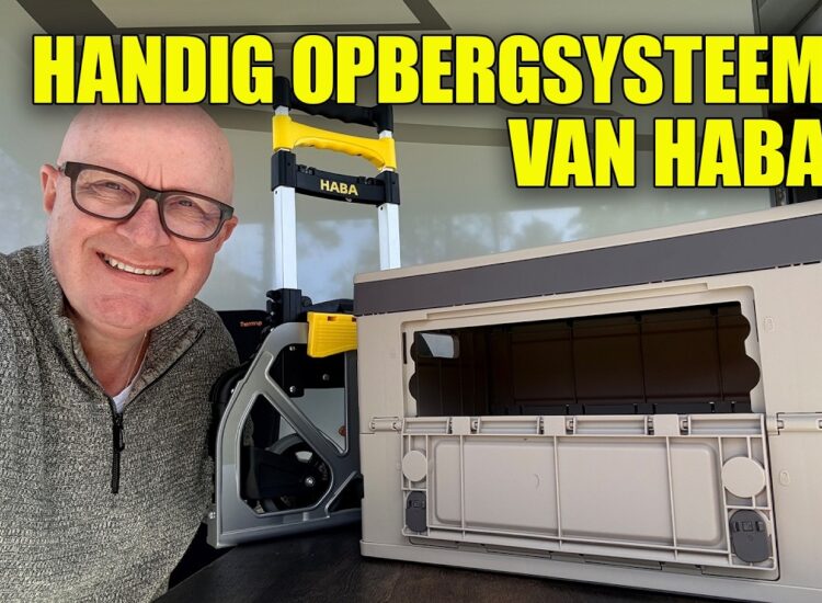Videostill van de Haba Campbox Nomad opvouwbare krat met open luik en de Alu Carry 65 steekwagen, getest door Campingtrend