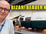 Videostill van de uitgeschoven Beauer X8 uitschuifcaravan met zicht op het kookeiland en de woonkamer op de Caravan Salon in Düsseldorf.