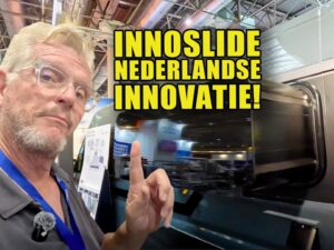 Videostill van de vernieuwde Horrex Inno-Slide slide-out met XXL bed van 2,40 meter in een buscamper